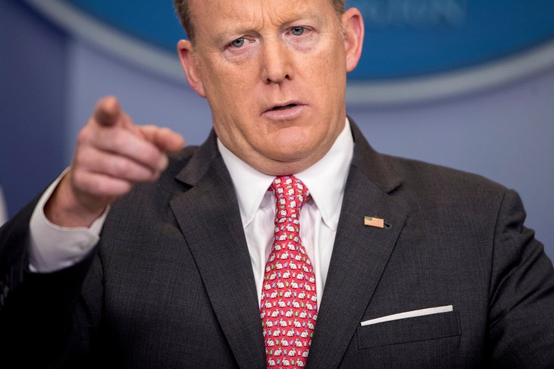 White House press secretary Sean Spicer wears an easter bunny tie as he talks to the media during the daily press briefing at the White House, Monday, April 17, 2017, in Washington. Spicer discussed the president's tax returns, policy on White House visitor logs and other topics. (AP Photo/Andrew Harnik)