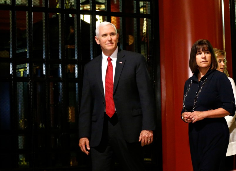 U.S. Vice President Mike Pence, center,  and his wife Karen, second from right, with their daughters visit the main shrine of Sensoji Buddhist temple in Tokyo, Tuesday, April 18, 2017. (AP Photo/Shuji Kajiyama)