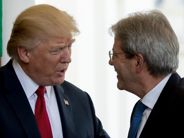 President Donald Trump greets Italian Prime Minister Paolo Gentiloni as he arrives at the West Wing of the White House in Washington, Thursday, April 20, 2017. (AP Photo/Andrew Harnik)
