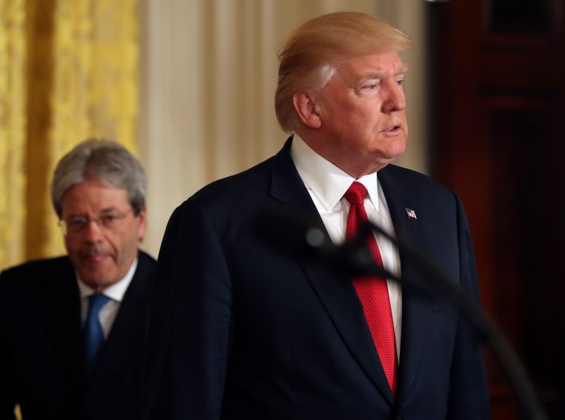 President Donald Trump and Italian Prime Minister Paolo Gentiloni hold a joint news conference in the East Room of the White House in Washington, Thursday, April 20, 2017. (AP Photo/Andrew Harnik)