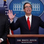 Treasury Secretary Steven Mnuchin, joined by National Economic Director Gary Cohn, speaks in the briefing room of the White House, in Washington, Wednesday, April 26, 2017. President Donald Trump is proposing dramatically reducing the taxes paid by corporations big and small in an overhaul his administration says will spur economic growth and bring jobs and prosperity to the middle class. (AP Photo/Carolyn Kaster)