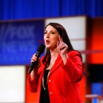 Ronna Romney McDaniel, the Michigan Republican Party chair, speaks before a Republican presidential primary debate at Fox Theatre, Thursday, March 3, 2016, in Detroit. (AP Photo/Paul Sancya)