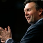 Former Obama White House press secretary Josh Earnest participates in a forum called "The Press & the Presidency," Tuesday, March 7, 2017, at the John F. Kennedy School of Government on the campus of Harvard University, in Cambridge, Mass. Earnest has accused President Donald Trump of using wiretapping allegations as a distraction. (AP Photo/Steven Senne)