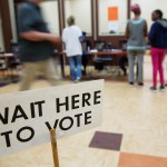 Voters line up to cast ballots in a special election in Atlanta, Tuesday, April 18, 2017. Republicans are bidding to prevent a major upset in a conservative Georgia congressional district Tuesday where Democrats stoked by opposition to President Donald Trump have rallied behind a candidate who has raised a shocking amount of money for a special election. (AP Photo/David Goldman)