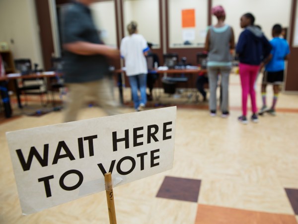 Voters line up to cast ballots in a special election in Atlanta, Tuesday, April 18, 2017. Republicans are bidding to prevent a major upset in a conservative Georgia congressional district Tuesday where Democrats stoked by opposition to President Donald Trump have rallied behind a candidate who has raised a shocking amount of money for a special election. (AP Photo/David Goldman)