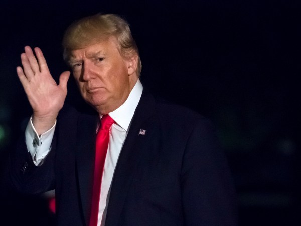 President Donald Trump waves as he walks across the south lawn of the White House in Washington late Saturday night, April 29, 2017 on this return from a rally in Harrisburg, PA. (AP Photo/J. David Ake)