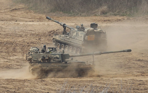 South Korean army K-9 self-propelled howitzers move during the annual exercise in Paju, South Korea, near the border with North Korea, Saturday, April 29, 2017. A North Korean mid-range ballistic missile apparently failed shortly after launch Saturday, South Korea and the United States said, the third test-fire flop just this month but a clear message of defiance as a U.S. supercarrier conducts drills in nearby waters. (AP Photo/Ahn Young-joon)