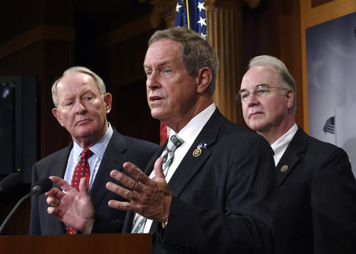 Rep. Joe Wilson, R-S.C., second from left, speaks during a news conference on Capitol Hill in Washington, Monday, July 27, 2015, where the Employee Rights Act was discussed. Wilson is joined by, from left, Sen. Lamar Alexander, R-Tenn., Rep. Tom Price, R-Ga., Rep. David Rouzer, R-N.C., and Sen. Orrin Hatch, R-Utah. (AP Photo/Susan Walsh)