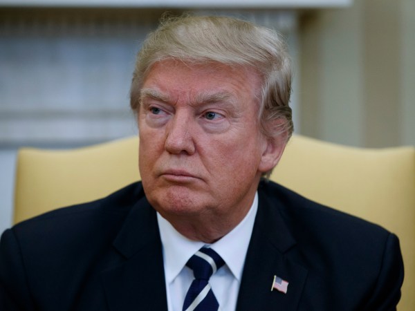 President Donald Trump listens during a meeting with Egyptian President Abdel Fattah al-Sisi in the Oval Office of the White House, Monday, April 3, 2017, in Washington. (AP Photo/Evan Vucci)