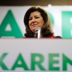 Republican candidate for Georgia's Sixth Congressional seat Karen Handel updates supporters on early results at an election night watch party in Roswell, Ga., Tuesday, April 18, 2017. Republicans are bidding to prevent a major upset in a conservative Georgia congressional district Tuesday where Democrats stoked by opposition to President Donald Trump have rallied behind a candidate who has raised a shocking amount of money for a special election. (AP Photo/David Goldman)