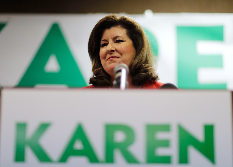 Republican candidate for Georgia's Sixth Congressional seat Karen Handel updates supporters on early results at an election night watch party in Roswell, Ga., Tuesday, April 18, 2017. Republicans are bidding to prevent a major upset in a conservative Georgia congressional district Tuesday where Democrats stoked by opposition to President Donald Trump have rallied behind a candidate who has raised a shocking amount of money for a special election. (AP Photo/David Goldman)