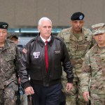 U.S. Vice President Mike Pence arrives with U.S. Gen. Vincent Brooks, second from right, commander of the United Nations Command, US Forces Korea and Combined Forces Command, and South Korean Deputy Commander of the Combined Force Command Gen. Leem Ho-young, left, at the border village of Panmunjom in the Demilitarized Zone (DMZ) which has separated the two Koreas since the Korean War, South Korea, Monday, April 17, 2017.  Viewing his adversaries in the distance, U.S. Vice President Mike Pence traveled to the tense zone dividing North and South Korea and warned Pyongyang that after years of testing the U.S. and South Korea with its nuclear ambitions, "the era of strategic patience is over." (AP Photo/Lee Jin-man)