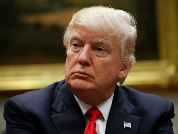 President Donald Trump listens during a meeting with the National Association of Manufacturers in the Roosevelt Room of the White House, Friday, March 31, 2017, in Washington. (AP Photo/Evan Vucci)