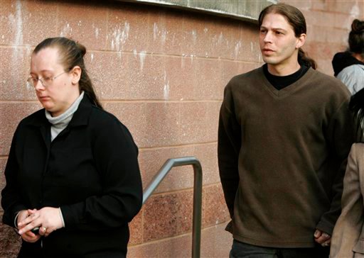 FILE - In this March 12, 2009 file photograph, Isidore Heath Campbell, right, and his wife, Deborah, leave the Hunterdon County Justice Center in Flemington, N.J., after a court hearing to determine custody of their three children with Nazi-inspired names. Campbell who received approval to change his last name to Hitler had the change legally go into effect this week. MyCentralJersey.com  reported Isidore Heath Campbell officially became Isidore Heath Hitler on Monday, May 8, 2017. (AP Photo/Mike Derer, File)