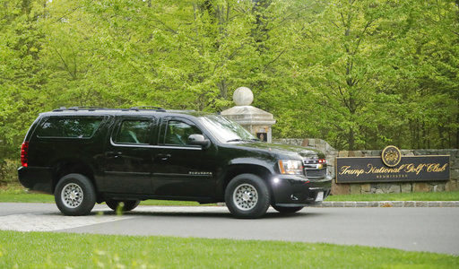 Motorcade SUV vehicle transporting President Donald Trump is seen leaving the Trump National Golf Club in Bedminster, N.J., Sunday, May 7, 2017. Trump spent the weekend at his New Jersey golf course and is returning to Washington tonight. (AP Photo/Pablo Martinez Monsivais)