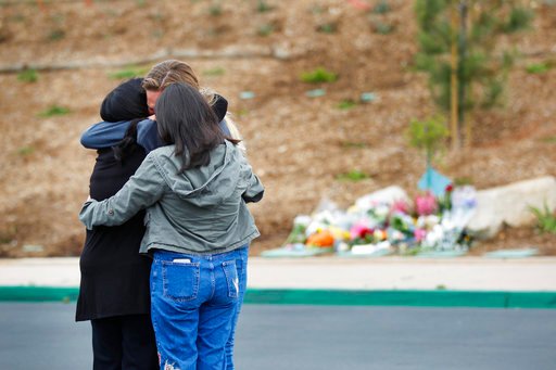 ***MANDATORY CREDIT: K.C. Alfred / San Diego Union-Tribune*** MANDATORY CREDIT***, NO SALES, NO FOREIGN, NO MAGS, NO TELEVISION, NO INTERNET***LOS ANGELES DAILY NEWS OUT, ORANGE COUNTY REGISTER OUT, INLAND VALLEY DAILY BULLETIN OUT, LA OPINION OUT.SAN DIEGO, CA - MAY 7, 2017 - People gathered at Torrey Pines High School Sunday near a memorial for a 15 year-old student that was shot and killed by police in the parking lot the day before. (Photo by K.C. Alfred/The San Diego Union-Tribune)