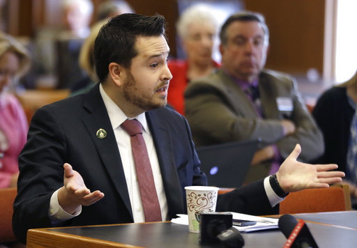 New Hampshire State Rep. Robert Fisher speaks during a public hearing at the Legislative Office Building, Tuesday, May 9, 2017, in Concord, N.H., to defend himself on alleged comments he made online about filming sexual encounters with women and degrading their intelligence. Fisher says his comments have been taken out of context. (AP Photo/Elise Amendola)