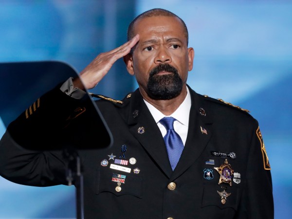 David Clarke, Sheriff of Milwaukee County, Wis., salutes after speaking during the opening day of the Republican National Convention in Cleveland, Monday, July 18, 2016. (AP Photo/J. Scott Applewhite)