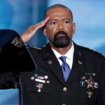 David Clarke, Sheriff of Milwaukee County, Wis., salutes after speaking during the opening day of the Republican National Convention in Cleveland, Monday, July 18, 2016. (AP Photo/J. Scott Applewhite)