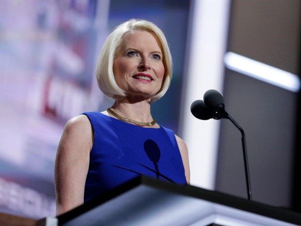 Callista Gingrich tests the speaking setup before the third day session of the GOP 2016 Convention, Wednesday, July 20, 2016, in Cleveland. (AP Photo/John Locher)