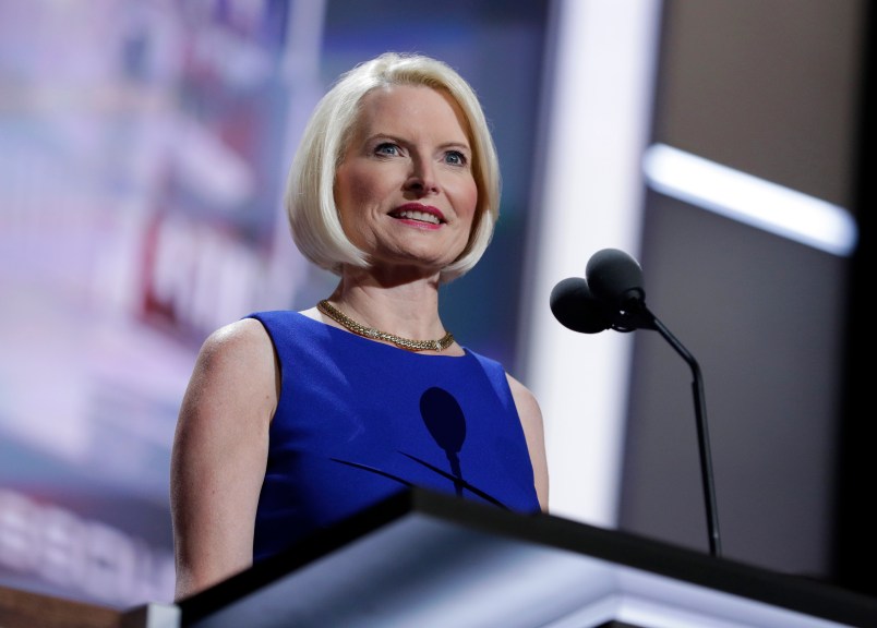 Callista Gingrich tests the speaking setup before the third day session of the GOP 2016 Convention, Wednesday, July 20, 2016, in Cleveland. (AP Photo/John Locher)