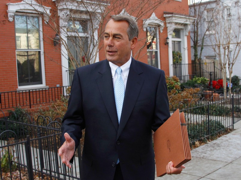 FILE - In this Jan. 5, 2011, file photo, U.S. Rep. John Boehner, R-Ohio, who was elected House Speaker later that day during the 112th Congress, walks out of his home on Capitol Hill in Washington. The prominent Washington-based law and lobbying firm Squire Patton Boggs said Tuesday, Sept. 20, 2016, that former House Speaker John Boehner is joining the international firm as a strategic adviser to clients, focusing on global business development, but won't be a lobbyist. (AP Photo/Alex Brandon, File)