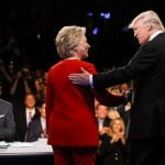 Democratic presidential nominee Hillary Clinton and Republican presidential nominee Donald Trump shake hands during the presidential debate at Hofstra University in Hempstead, N.Y., Monday, Sept. 26, 2016. (Joe Raedle/Pool via AP)