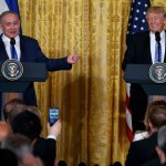 FILE - In this Wednesday, Feb. 15, 2017 file photos, President Donald Trump listens as Israeli Prime Minister Benjamin Netanyahu speaks during their joint news conference in the East Room of the White House,  in Washington. Trump and Netanyahu said at their first joint news conference that they will seize what they believe is an opportunity for an ambitious Israeli-Arab peace deal. (AP Photo/Evan Vucci, File)