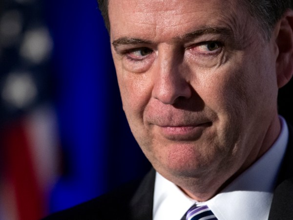 FBI Director James Comey adddresses the Intelligence and National Security Alliance Leadership Dinner in Alexandria, Va., Wednesday, March 29, 2017. (AP Photo/Cliff Owen)