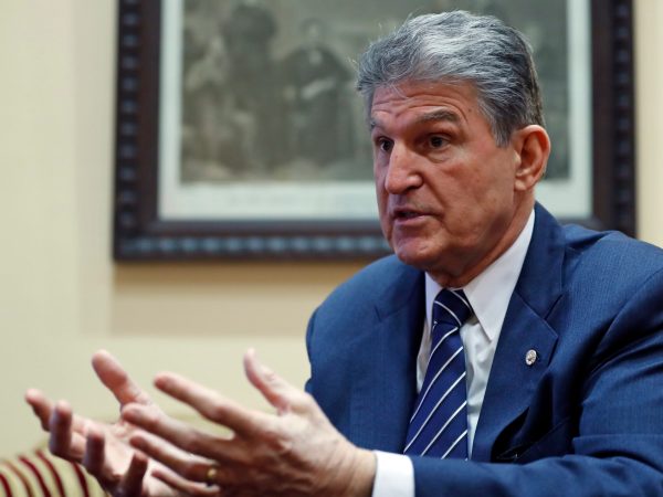 FILE In this Feb. 1, 2017 file photo, Sen. Joe Manchin, D-W.Va. is interviewed by The Associated Press in his office on Capitol Hill in Washington. Emboldened by a wave of outrage against President Donald Trump, groups of liberal activists are targeting Democratic incumbents they consider too accommodating to the new administration. Their efforts could make life awfully uncomfortable for a party dreaming of an electoral come-back next year.  (AP Photo/Alex Brandon)