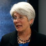 Jane Meyer, former senior associate athletic director at the University of Iowa, speaks during a news conference, Thursday, May 4, 2017, in Des Moines, Iowa. A jury on Thursday awarded more than $1.4 million to Meyer ruling that the university had discriminated against her because of her gender and sexual orientation. (AP Photo/Charlie Neibergall)