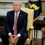 President Donald Trump pauses after speaking to reporters during a meeting with former Secretary of State Henry Kissinger in the Oval Office of the White House, Wednesday, May 10, 2017, in Washington. (AP Photo/Evan Vucci)
