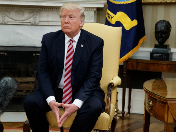 President Donald Trump pauses after speaking to reporters during a meeting with former Secretary of State Henry Kissinger in the Oval Office of the White House, Wednesday, May 10, 2017, in Washington. (AP Photo/Evan Vucci)