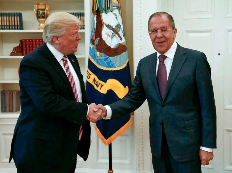 President Donald Trump shakes hands with Russian Russian Foreign Minister Sergey Lavrov in the White House in Washington, Wednesday, May 10, 2017.President Donald Trump on Wednesday welcomed Vladimir Putin's top diplomat to the White House for Trump’s highest level face-to-face contact with a Russian government official since he took office in January. (Russian Foreign Ministry Photo via AP)