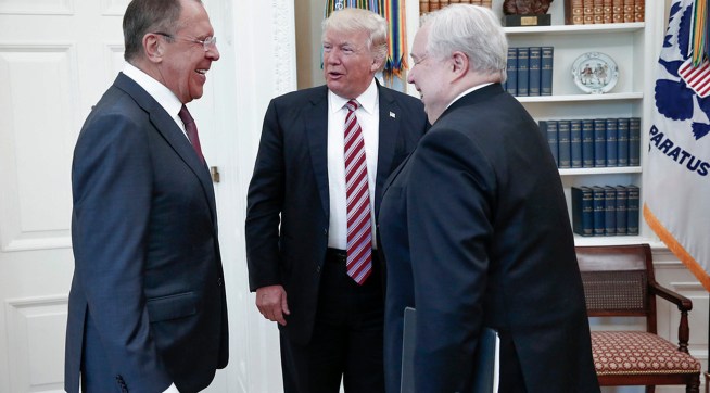 President Donald Trump meets with Russian Russian Foreign Minister Sergey Lavrov, left, in the White House in Washington, Wednesday, May 10, 2017. At right is Russian Ambassador to USA Sergei Kislyak. President Donald Trump on Wednesday welcomed Vladimir Putin's top diplomat to the White House for Trump’s highest level face-to-face contact with a Russian government official since he took office in January. (Russian Foreign Ministry Photo via AP)