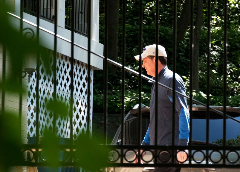 Former FBI Director James Comey walks at his home in McLean, Va., Wednesday, May 10, 2017. President Donald Trump fired Comey on Tuesday, ousting the nation's top law enforcement official in the midst of an investigation into whether Trump's campaign had ties to Russia's election meddling. (AP Photo/Sait Serkan Gurbuz)