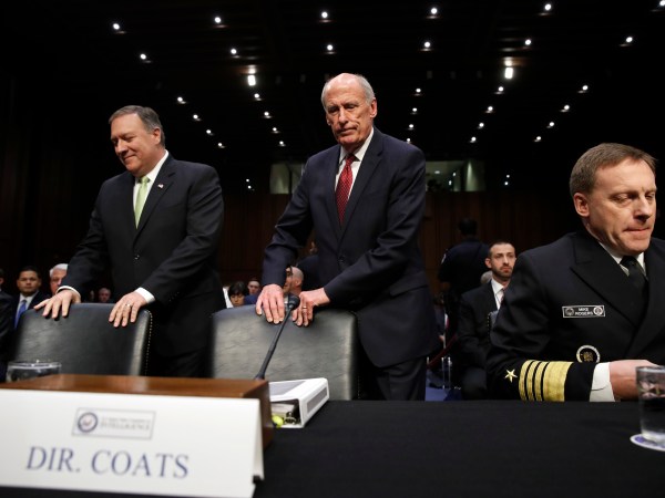 CIA Director Mike Pompeo, left, and Director of National Intelligence Dan Coats, take their seats next to National Security Agency Director Adm. Michael Rogers, during a Senate Intelligence Committee hearing, on Capitol Hill in Washington, Thursday, May 11, 2017. It is an annual hearing about the major threats facing the U.S., but former FBI Director Jim Comey's sudden firing is certain to be a focus of questions. (AP Photo/Jacquelyn Martin)