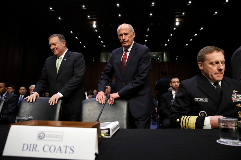 CIA Director Mike Pompeo, left, and Director of National Intelligence Dan Coats, take their seats next to National Security Agency Director Adm. Michael Rogers, during a Senate Intelligence Committee hearing, on Capitol Hill in Washington, Thursday, May 11, 2017. It is an annual hearing about the major threats facing the U.S., but former FBI Director Jim Comey's sudden firing is certain to be a focus of questions. (AP Photo/Jacquelyn Martin)