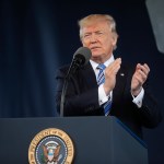 President Donald Trump applauds the Class of 2017 as he gives the commencement address at Liberty University in Lynchburg, Va., Saturday, May 13, 2017. (AP Photo/Pablo Martinez Monsivais)