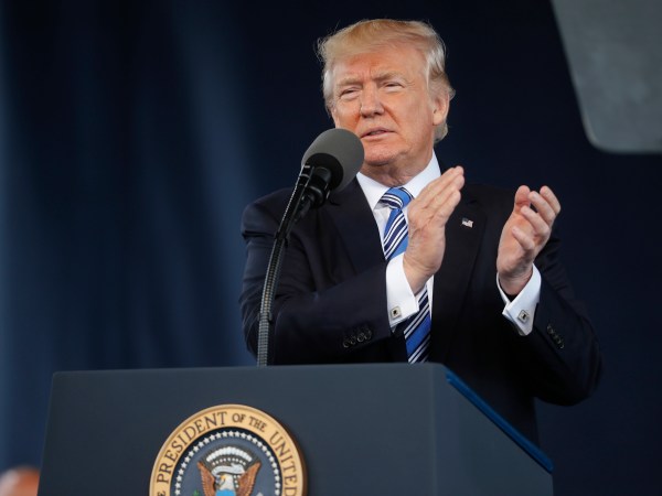 President Donald Trump applauds the Class of 2017 as he gives the commencement address at Liberty University in Lynchburg, Va., Saturday, May 13, 2017. (AP Photo/Pablo Martinez Monsivais)