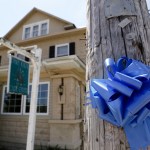 A blue ribbon adorns a telephone pole outside the Pine Kirk Care Center on Saturday, May 13, 2017 in Kirkersville, Ohio. The nursing home was the site of a fatal shooting on Friday, May 12, 2017 after Thomas Hartless, 43, of Utica, shot Kirkersville police chief Steven DiSario, nurse Marlina Medrano and nurse's aide Cindy Krantz. Hartless was later found dead inside the nursing home. [Joshua A. Bickel/Dispatch]