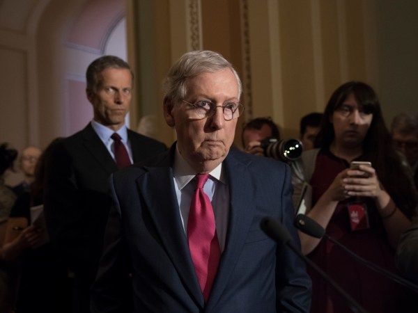 Senate Majority Leader Mitch McConnell, R-Ky., joined at left by Sen. John Thune, R-S.D., reacts to questions from reporters about President Donald Trump reportedly sharing classified information with two Russian diplomats during a meeting in the Oval Office, at the Capitol in Washington, Tuesday, May 16, 2017. (AP Photo/J. Scott Applewhite)