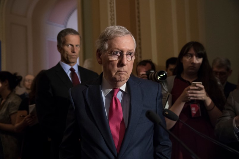 Senate Majority Leader Mitch McConnell, R-Ky., joined at left by Sen. John Thune, R-S.D., reacts to questions from reporters about President Donald Trump reportedly sharing classified information with two Russian diplomats during a meeting in the Oval Office, at the Capitol in Washington, Tuesday, May 16, 2017. (AP Photo/J. Scott Applewhite)