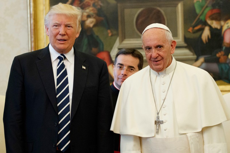 President Donald Trump stands with Pope Francis during a meeting, Wednesday, May 24, 2017, at the Vatican. (AP Photo/Evan Vucci)