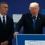 NATO Secretary General Jens Stoltenberg listens as President Donald Trump speaks during a ceremony to unveil artifacts from the World Trade Center and Berlin Wall for the new NATO headquarters, Thursday, May 25, 2017, in Brussels. (AP Photo/Evan Vucci)