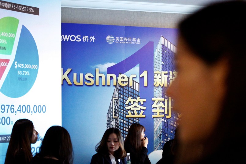 Chinese staffer wait for investors at a reception desk during an event promoting EB-5 investment in a Kushner Companies development at a hotel in Shanghai, China, Sunday, May. 7, 2017. The sister of President Donald Trump’s son-in-law, Jared Kushner, has been courting Chinese investors using a much-criticized federal visa program that provides a path toward obtaining green cards.