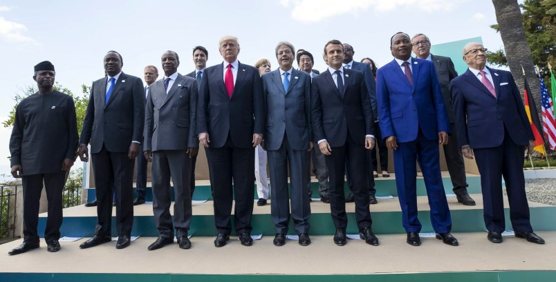 G7 and African leaders pose for a family photo in the Sicilian town of Taormina, Italy, Saturday, May 27, 2017. Leaders of the G7 meet Friday and Saturday, including newcomers Emmanuel Macron of France and Theresa May of Britain in an effort to forge a new dynamic after a year of global political turmoil amid a rise in nationalism. ANSA/ANGELO CARCONI