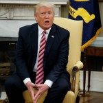 President Donald Trump talks to reporters during a meeting with former Secretary of State Henry Kissinger in the Oval Office of the White House, Wednesday, May 10, 2017, in Washington. (AP Photo/Evan Vucci)