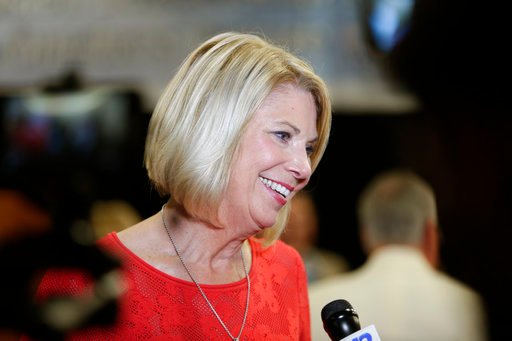 Republican Omaha mayor Jean Stothert smiles during a television interview after defeating Democratic mayoral candidate Heath Mello in the contest for mayor, in Omaha, Neb., Tuesday, May 9, 2017. The race has drawn national attention as Democrats seek new energy given huge Republican gains in local, state and federal offices across the country. (AP Photo/Nati Harnik)