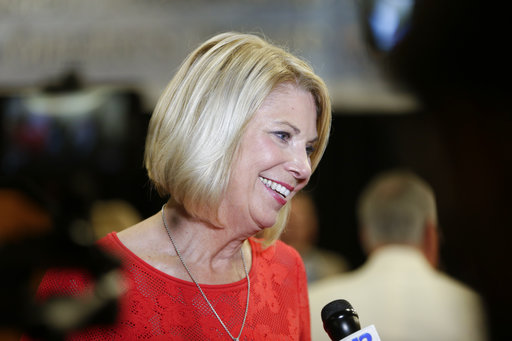 Republican Omaha mayor Jean Stothert smiles during a television interview after defeating Democratic mayoral candidate Heath Mello in the contest for mayor, in Omaha, Neb., Tuesday, May 9, 2017. The race has drawn national attention as Democrats seek new energy given huge Republican gains in local, state and federal offices across the country. (AP Photo/Nati Harnik)